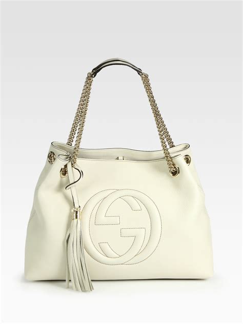 gucci bags 大连市辽宁省|white Gucci shopping bag.